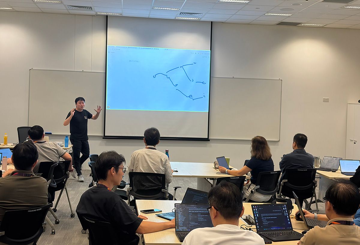 Walking through an AI workflow concept during the Changi East GA100 programme