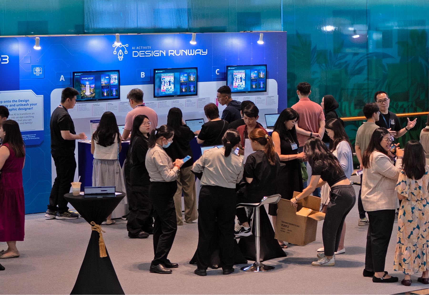 Participants at the Design Runway AI poster design booth