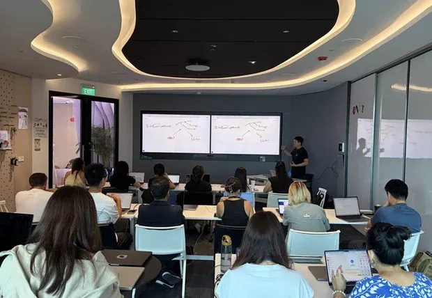 Team working through a hands-on AI exercise during a workshop